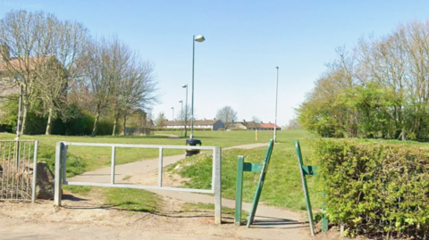 The entrance of a small park