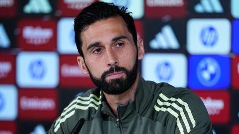 Alvaro Arbeloa at a press conference with Real Madrid