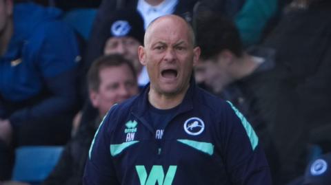 Alex Neil on the touchline
