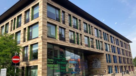 Wakefield Town Hall - a large moder building of glass and brick