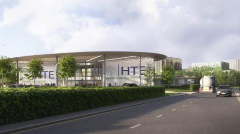 CGI Image showing the reception and innovation centre of a new hydrogen plant. There is lorry and a car driving on a road beside it.
