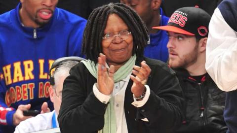 Whoopi Goldberg claps