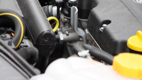 The inside of a Vauxhall car engine