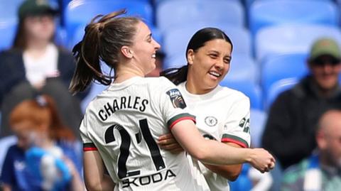 Sam Kerr celebrates with Chelsea team-mate Niamh Charles