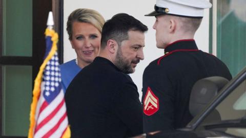 President Zelensky walks out of the White House after meeting with Donald Trump.