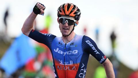 Eddie Dunbar celebrates victory on stage 20 of the Vuelta a Espana