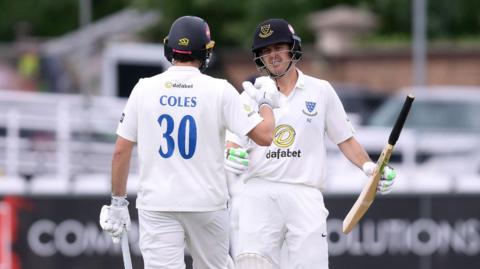 Sussex's James Coles (left) congratulates Daniel Hughes