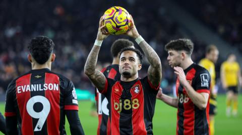 Justin Kluivert of Bournemouth celebrates after he scores a hat-trick of penalties to make it 4-2 during the Premier League match between Wolverhampton Wanderers FC and AFC Bournemouth at Molineux