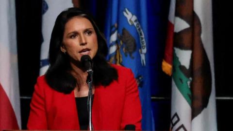 Tulsi Gabbard speaks at an event, endorsing Donald Trump