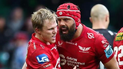 Josh Macleod celebrates with Blair Murray