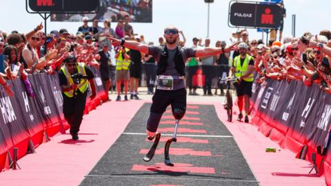 Billy Monger finishing a half Ironman in Hoorn, Netherlands, in June