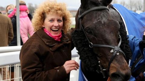 Lucinda Russell with 2021 Scottish Grand National winner Mighty Thunder