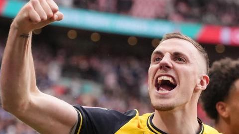 Southend United's Ben Goodliffe celebrates after winning the Isuzu FA Trophy final at Wembley Stadium, London