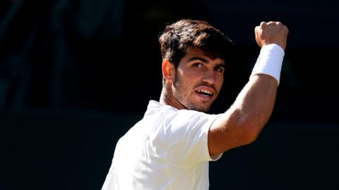 Carlos Alcaraz celebrates during his Wimbledon quarter-final win over Cameron Norrie