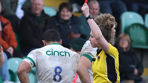 Referee Sara Cox shows Northampton's Iakopo Mapu a red card