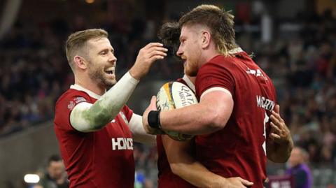 Lions celebrate a try