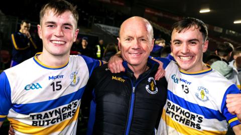 Ruairi Canavan and Darragh Canavan celebrate with their father Pater