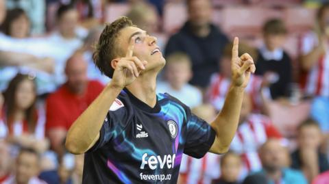 Scott Twine celebrates scoring at Sheffield United