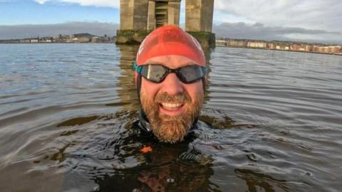 Calum Maclean in the water