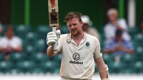 Sam Robson reaches his century