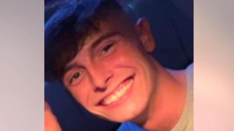 Ben Taylor smiling at the camera.