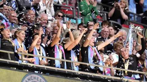 Man City players lift FA Cup