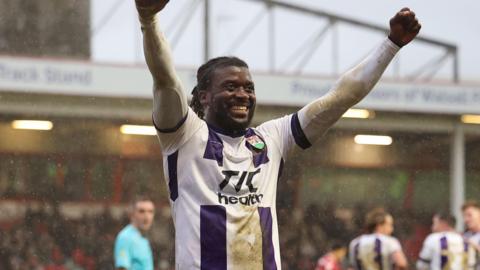 Kabongo Tshimanga celebrates scoring a goal in Barnet's 3-1 win at Walsall