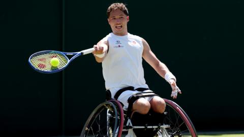 Alfie Hewett hits a forehand during his Wimbledon wheelchair singles match