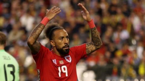 Sorba Thomas celebrates