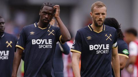 West Ham players walk off disappointed