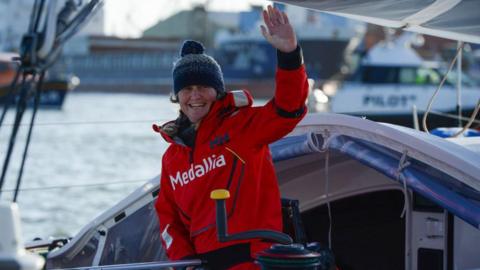 Pip Hare arrives at the quayside in Poole after becoming the first British skipper to finish the 2020/21 Vendee Globe race coming in 19th place 