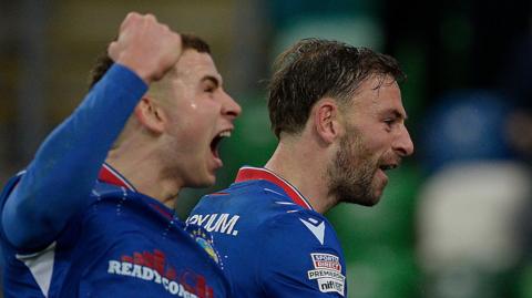 Matthew Fitzpatrick celebrates scoring the winner for Linfield against Cliftonville