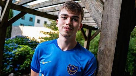 Eoin Kenny in a blue Portsmouth shirt
