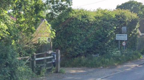 Cowfold sign on the A272 Bolney Road.