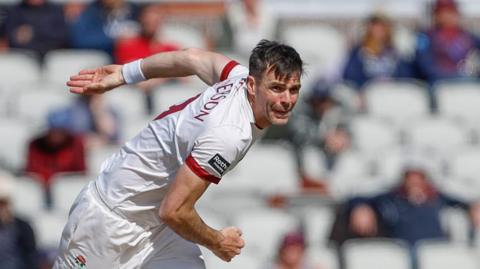 Sir James Anderson bowling for Lancashire