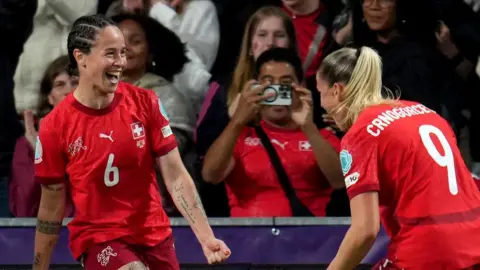 Gaeraldine Reuteler of Switzerland celebrates with teammates after scoring her team's first goal during the UEFA Women's EURO 2025 Group A match between Switzerland and Iceland at Stadion Wankdorf