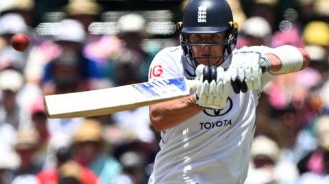 England wicketkeeper Jamie Smith plays a lofted shot off Australia's Marnus Labuschagne and is caught