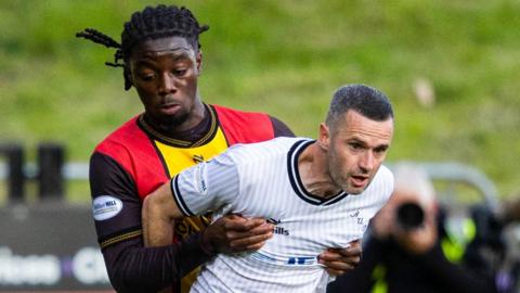 Partick Thistle's Kanayo Megwa and Ayr United's Jamie Murphy