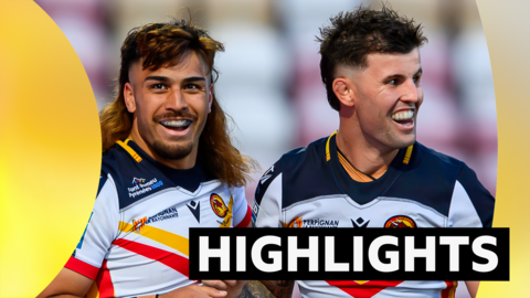 Two Catalans players smile while wearing gum shields