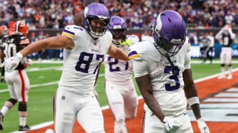 Jordan Addison celebrates scoring a touchdown for the Minnesota Vikings against the Cleveland Browns