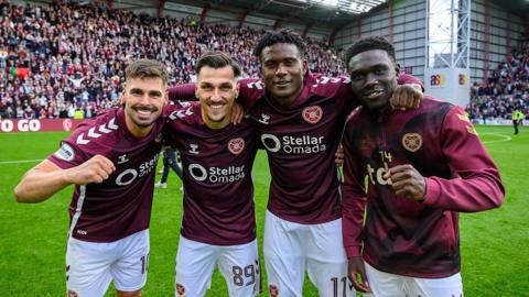 Claudio Braga, Alexandros Kyziridis, Pierre Landry Kabore and Rogers Mato celebrate after their win against Rangers.