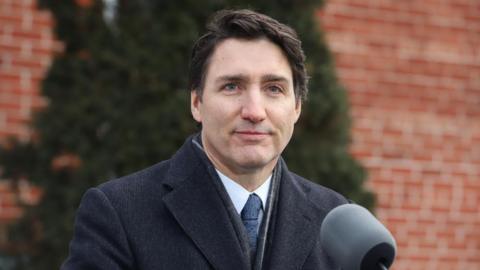 Canada's Prime Minister Justin Trudeau speaks to reporters, announcing he intends to step down as Liberal Party leader and Prime Minister,