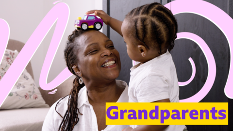 Grandmother and grand daughter playing together with toy car.