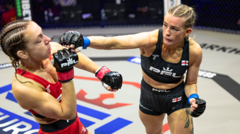 Sammy-Jo Luxton aims a punch at Gemma Auld in their fight