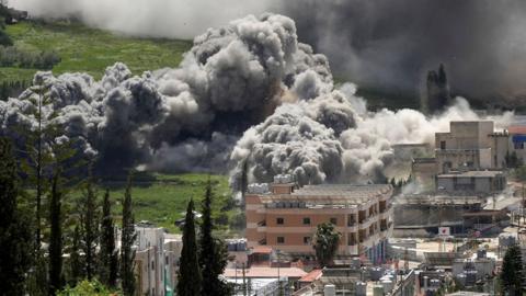 Smoke rises following an Israeli strike in Nabatieh, Lebanon