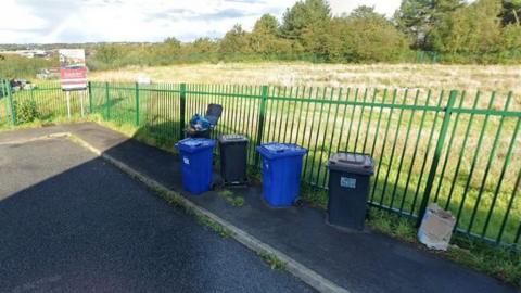 A fenced off area of land in Wolstanton, Newcastle-under-Lyme