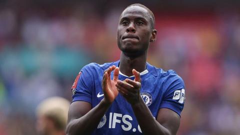Trevoh Chalobah applauds Chelsea fans during their FA Cup semi-final win over Leeds in April 2026