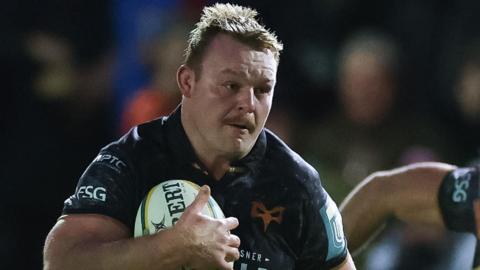 Dewi Lake in action with ball in hand for Ospreys