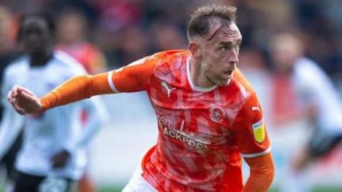 Richard Keogh in action for Blackpool