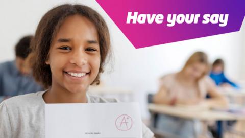 A child holding up an exam result paper with A+ on it, smiling. There is a text box in the top corner of the image saying "Have your say"